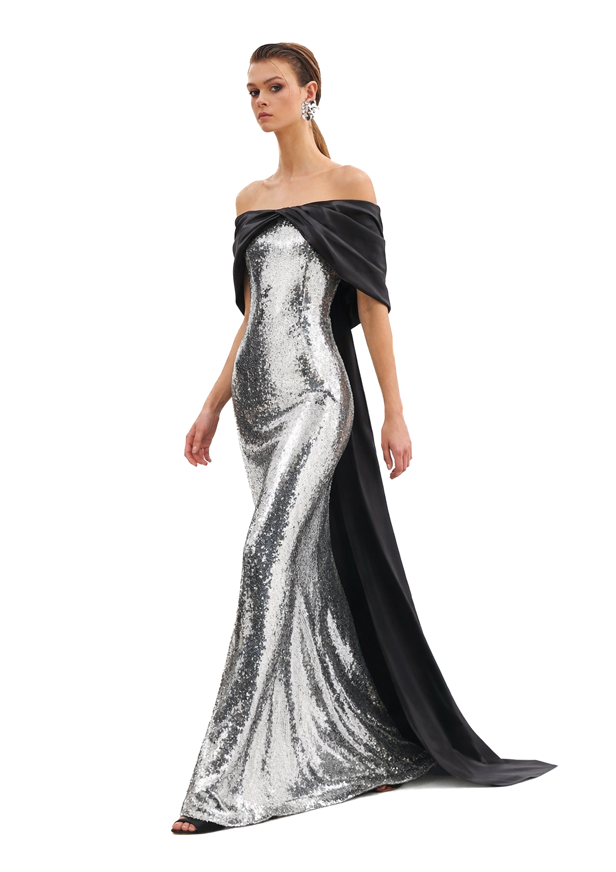 Silver sequin gown with bow sleeves, side profile showing train, Resort 26