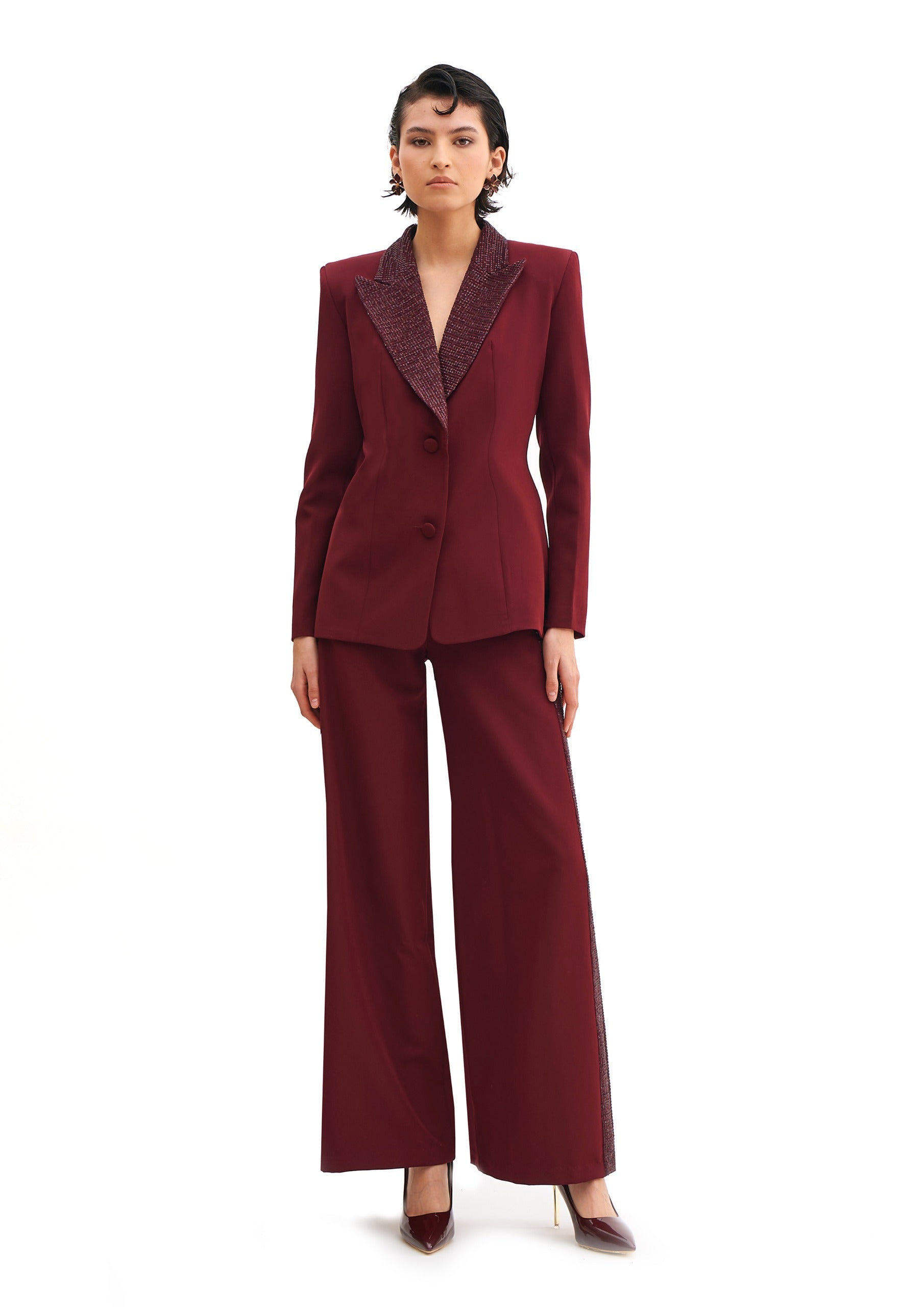 GARNET TROUSERS WITH STARLIT ACCENTS