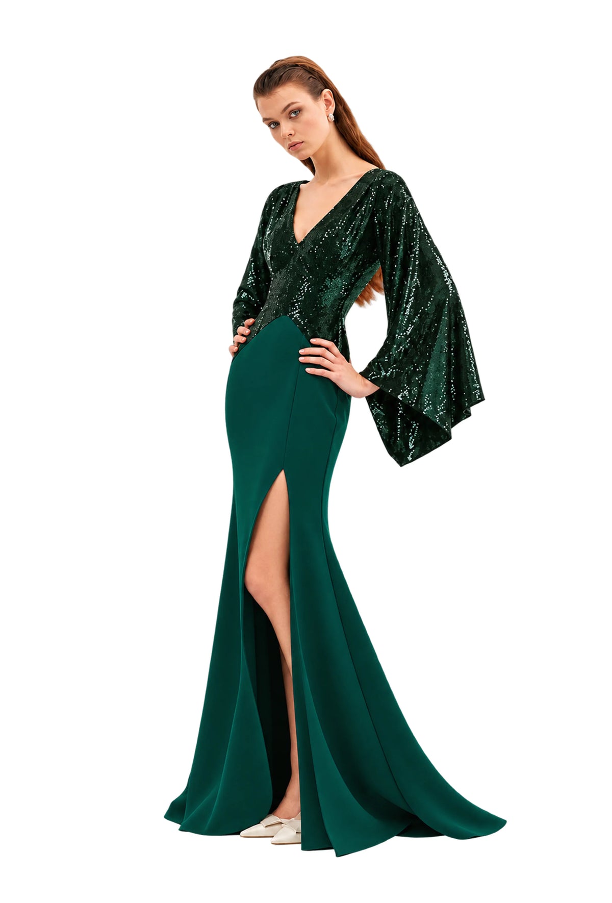 A model wearing a floor-length avarofiglio forest green evening kimono maxi dress with a sequined bodice, wide bell sleeves, and a thigh-high slit, photographed against a light gray studio background.