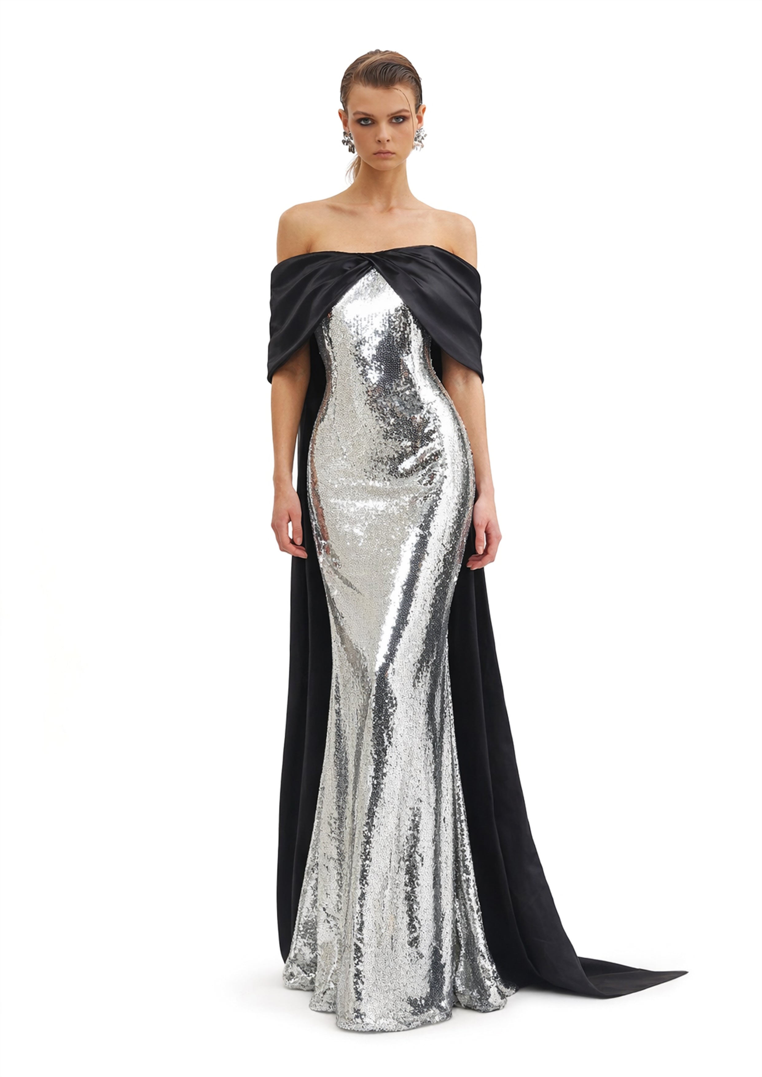 Silver sequin gown with bow detail at shoulder, front view, Avaro Figlio Resort 2026