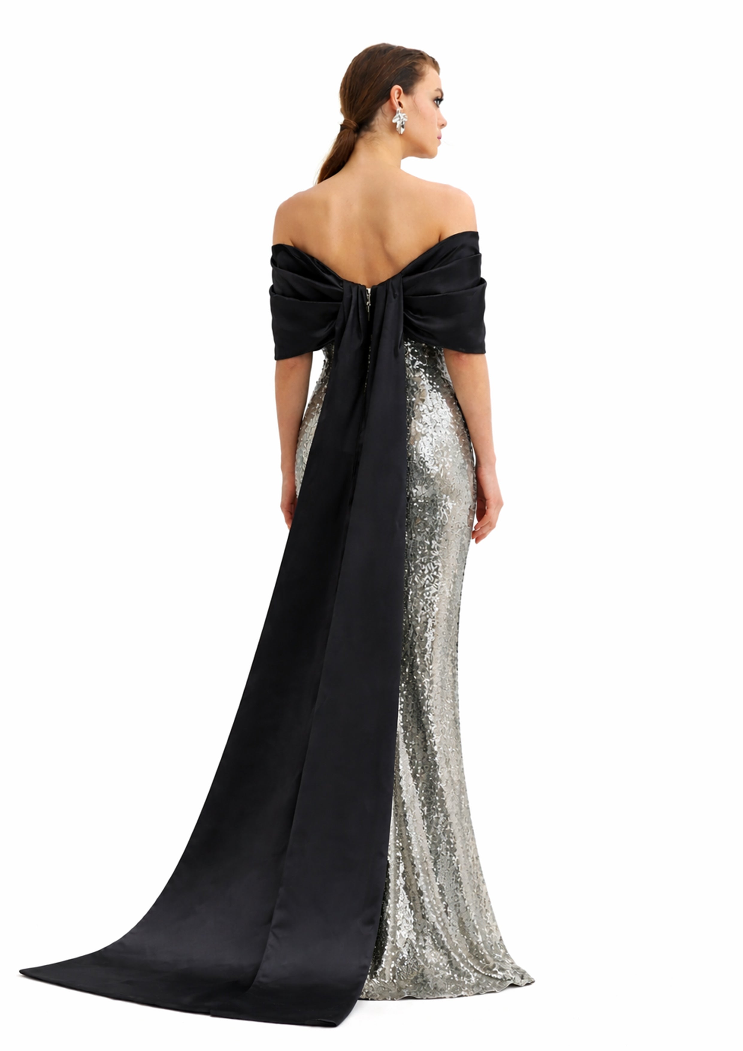 Silver sequin gown back view with draped train, Avaro Figlio Resort 2026