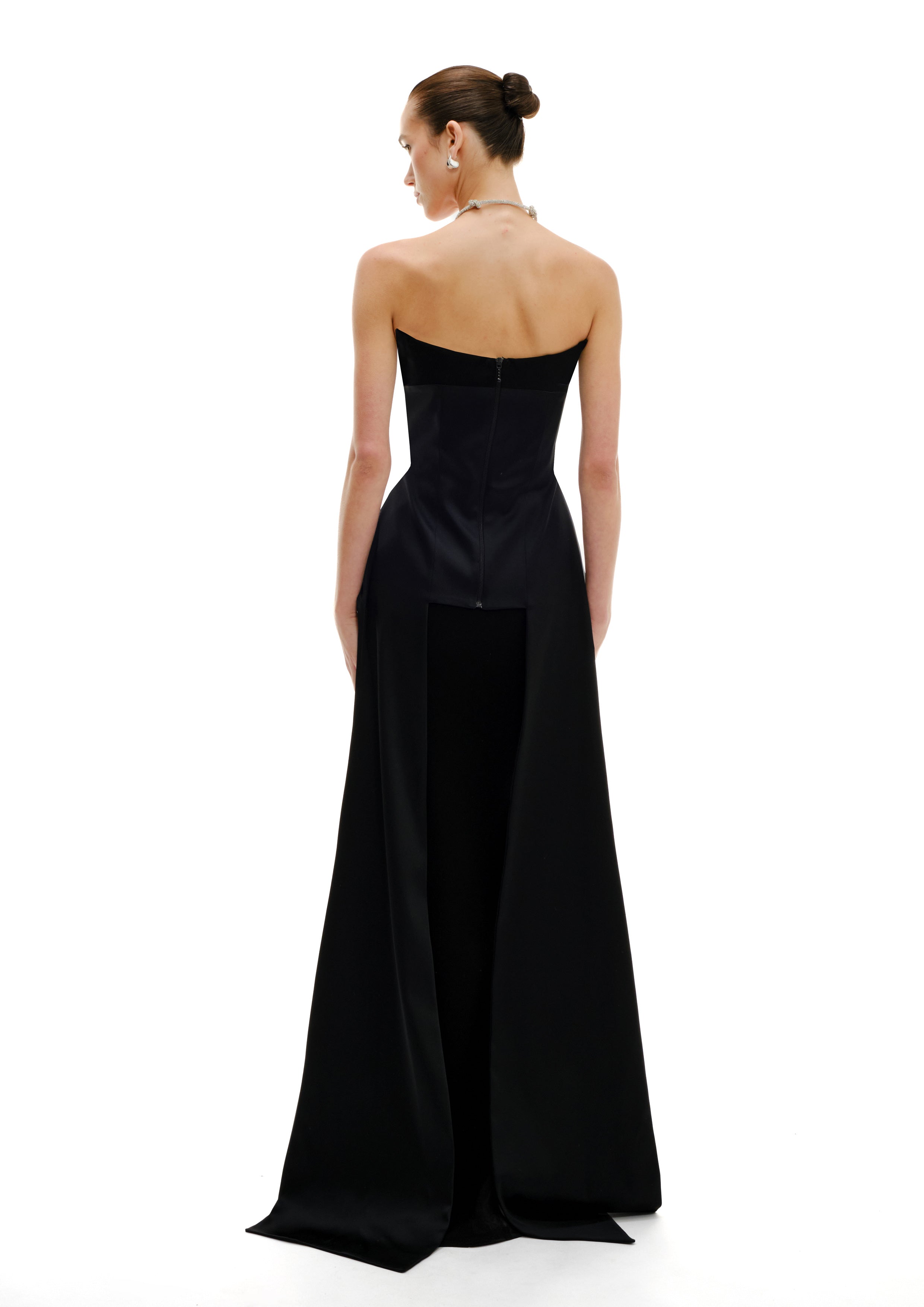 Black strapless gown with a slit Peplum bustier maxi dress back with queue detail, SS26