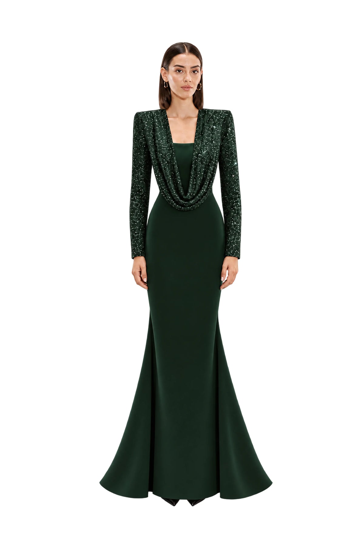 Model stands against a light gray studio background wearing a floor-length Avaro Figlio forest green gown with long sleeves, a draped cowl neckline, and a fitted mermaid silhouette.