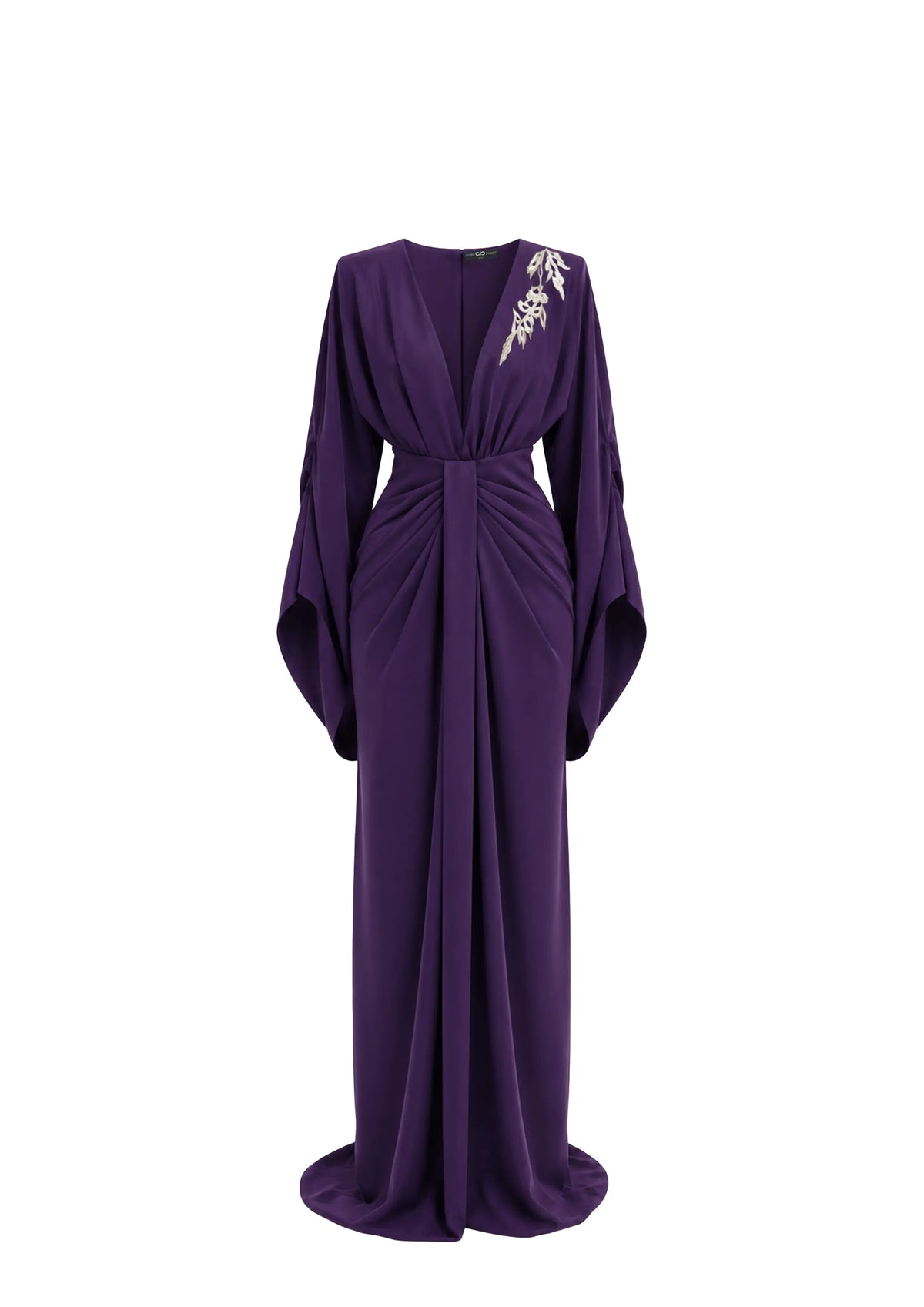 A floor-length purple avaro Figlio gown with long draped sleeves, a gathered waist, and a silver floral embroidery detail on the upper left shoulder, shown against a plain white background.