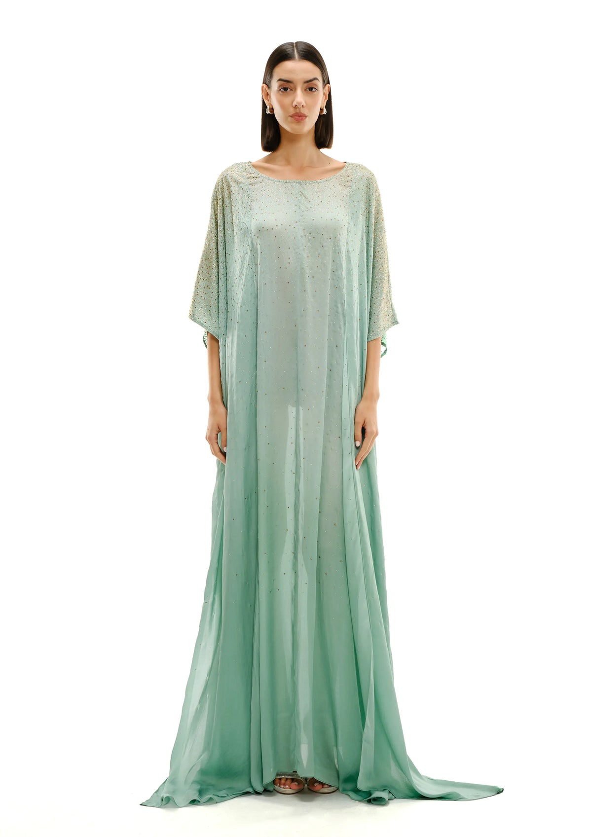 model wearing Avaro Figlio kaftan in green pastel with crystal gradient
