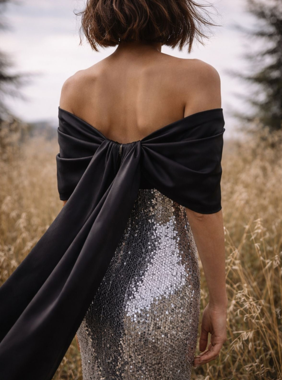 Silver sequined gown with bow sleeves, Avaro Figlio Resort 2026 evening collection