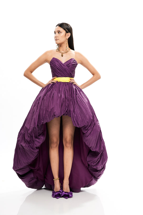 PLISSE' ASYMMETRICAL VOLUME GOWN WITH BOW